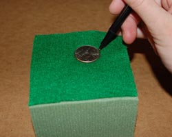 photo of marking quarter on felt