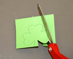 cutting out shamrock