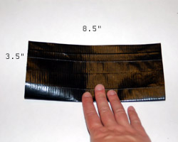 fold the sheet of tape in half