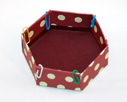paper clip the lid until it dries