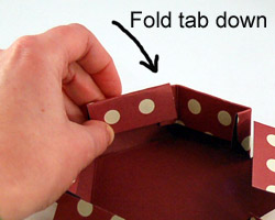 glue the tab down