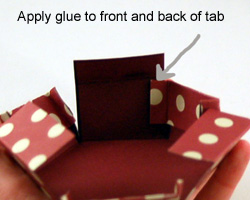 Place the side tab inside the fold on the next side
