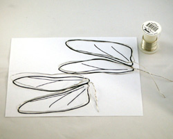 molding wire to the wing pattern