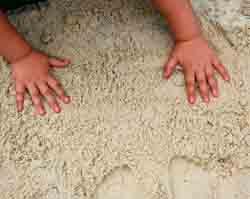 making handprints in the sand