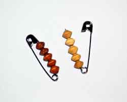 wooden beads on pin