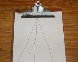 clip board to secure necklace