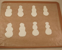 snowman glue bodies on wax paper