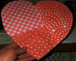 covering heart in paper