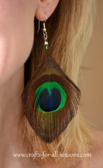 Work in progress. Feather earrings with peacock feathers. : r/crafts